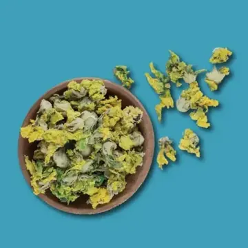 Dried yellow marigold flowers in a bowl
